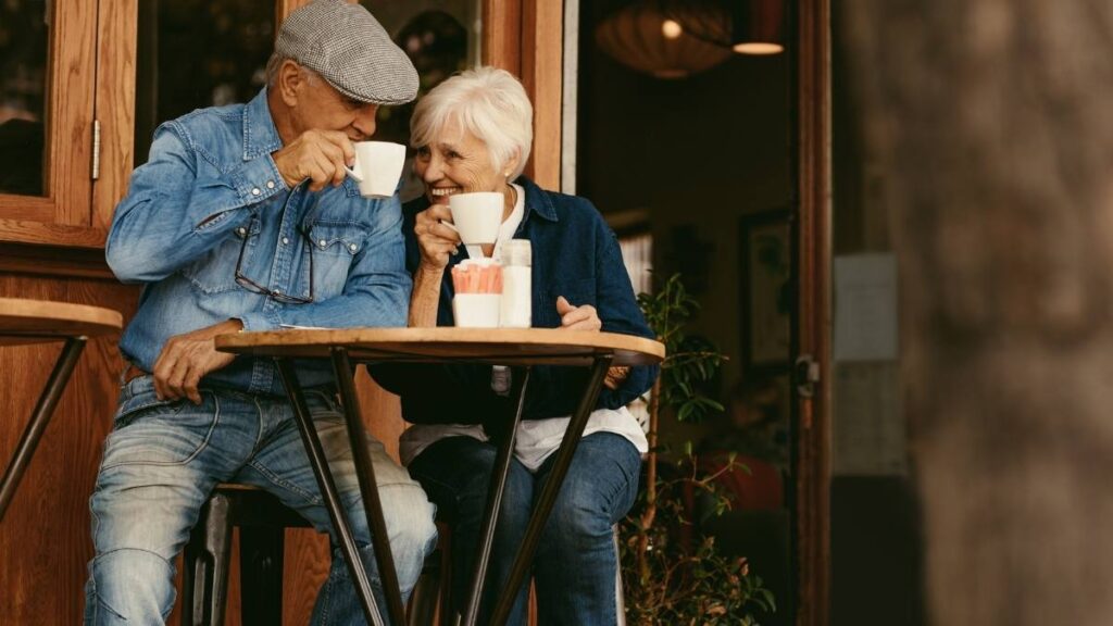 retired couple enjoying coffee