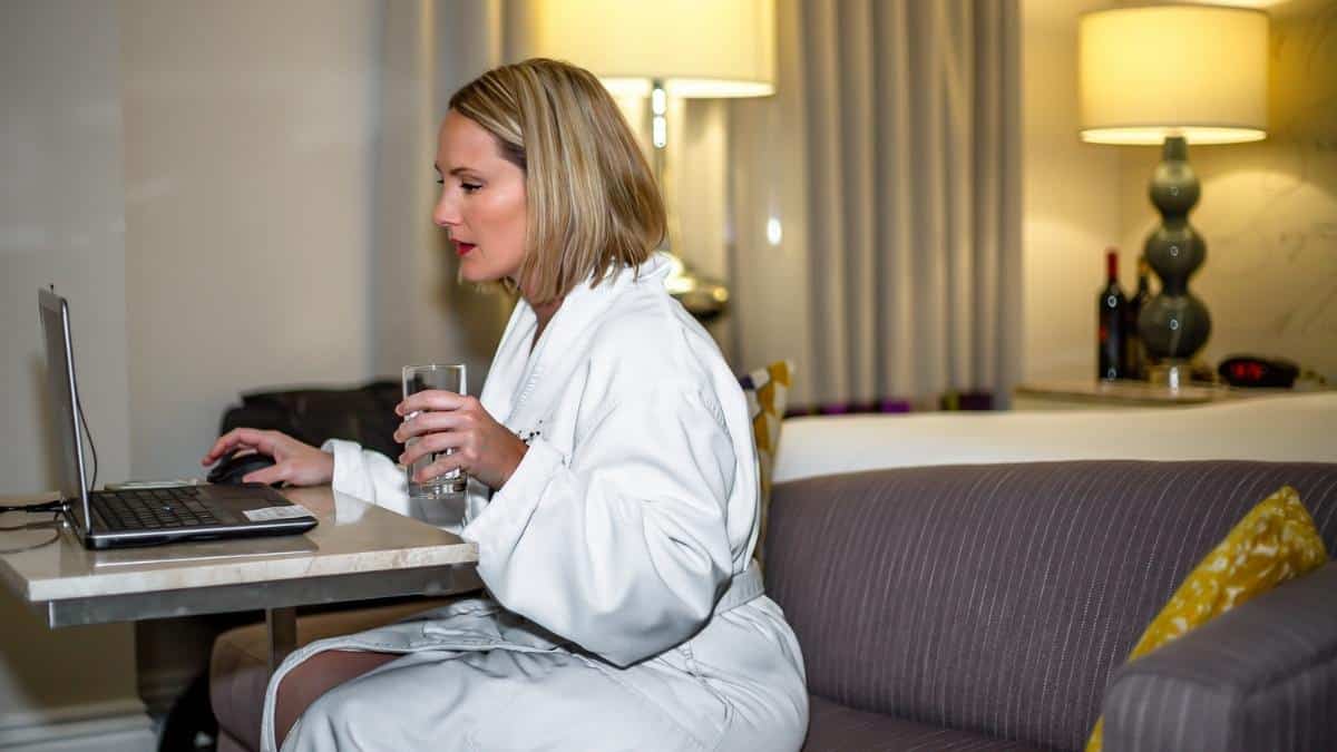 woman working from hotel room