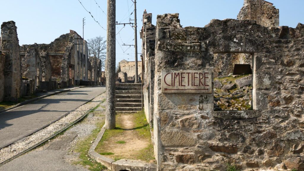 old street and cemetary sign in Oradour-sur-Glane