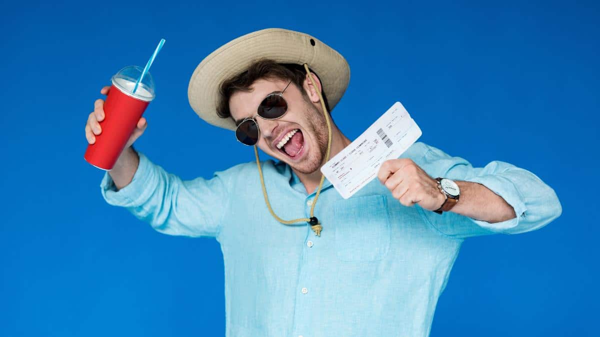 tourist man holding ticket