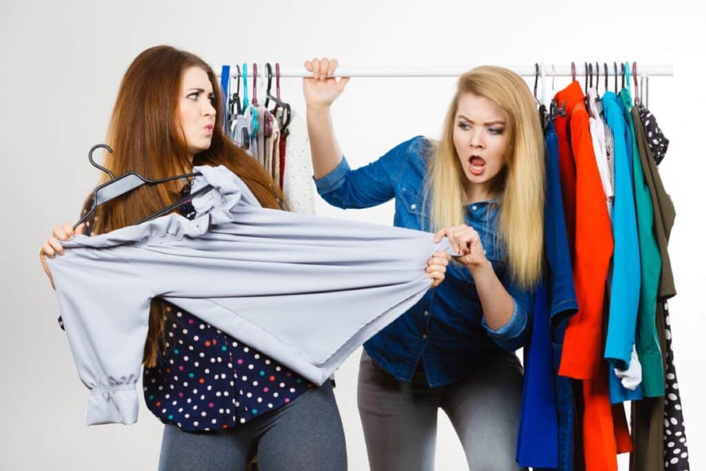 Women arguing during clothes shopping