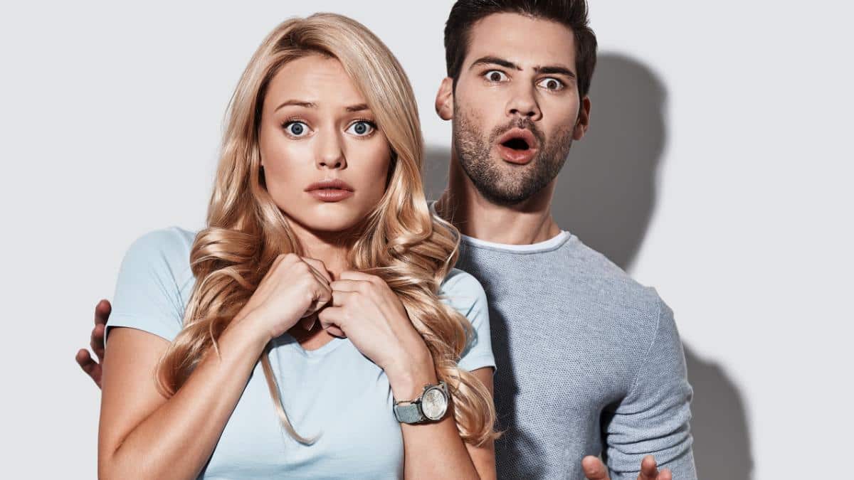 man and woman scared