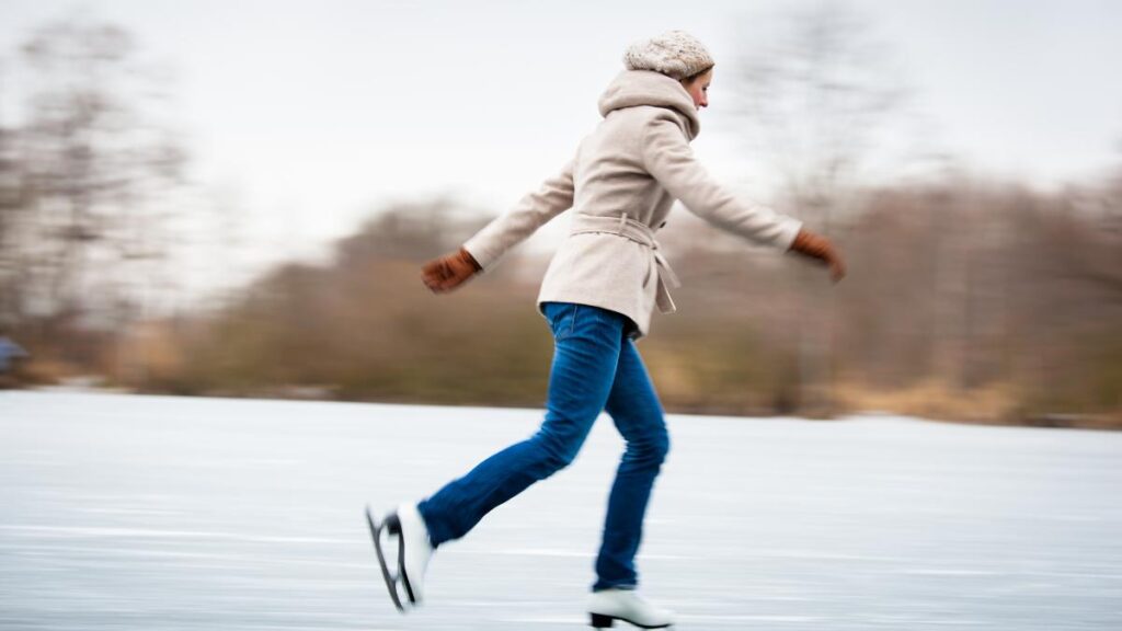 woman ice skating outdoors