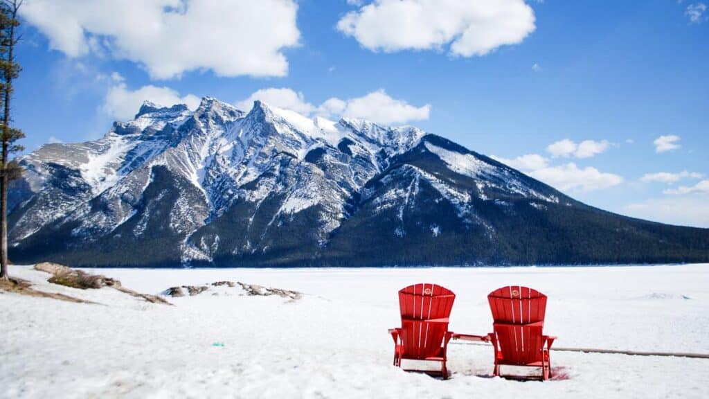 Banff frozen lake red chairs - DP