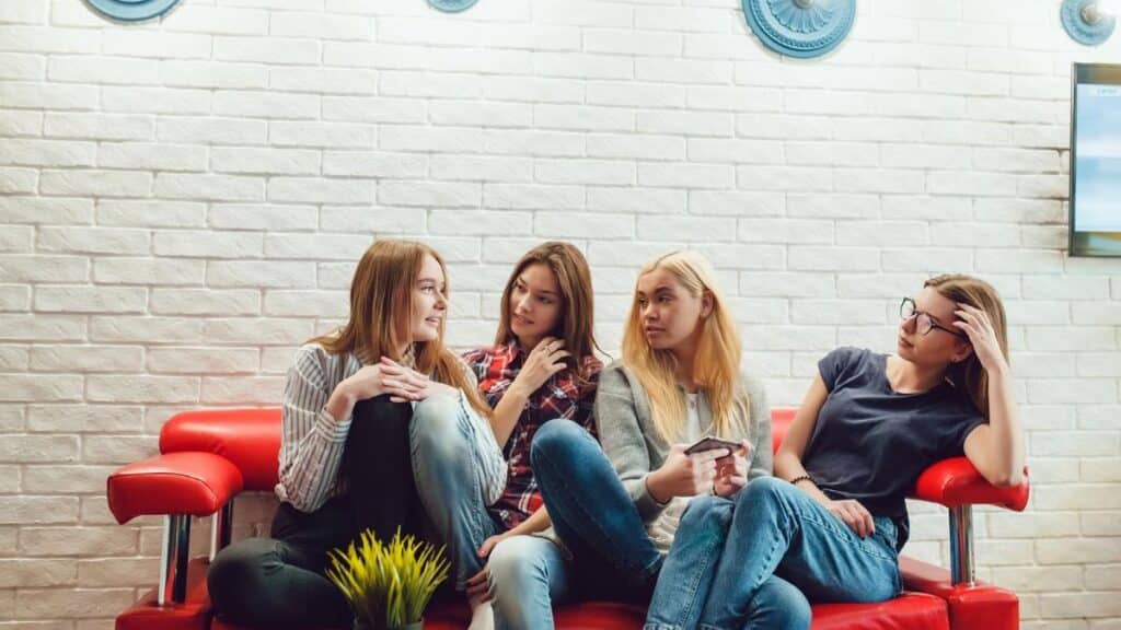 girls on couch in hotel