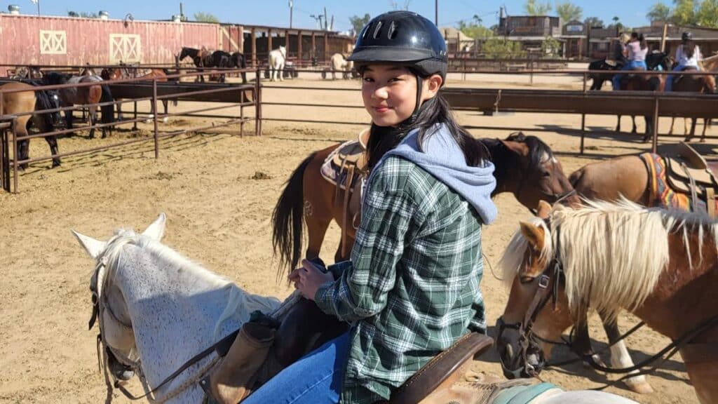 Sophia on a horse at MacDonald's Ranch - DP