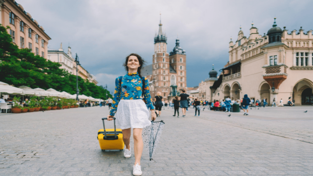 Traveler exploring Poland, Krakow city, Rynek Glowny square