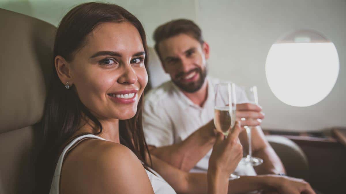 man and women in first class flight