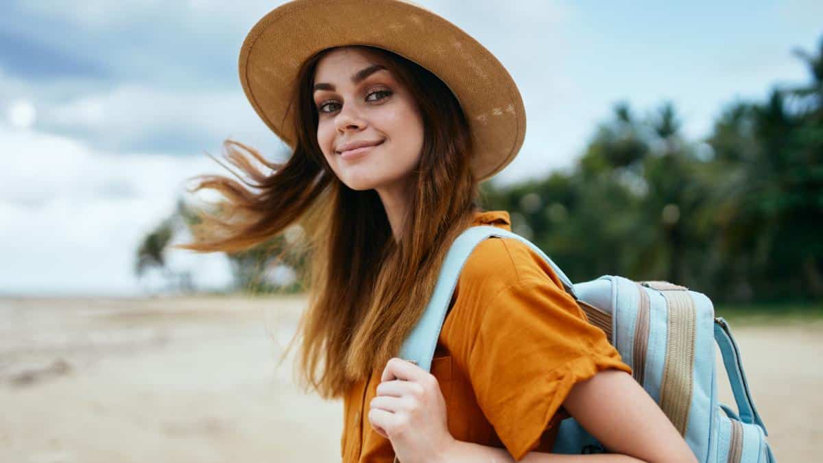 young woman with hat