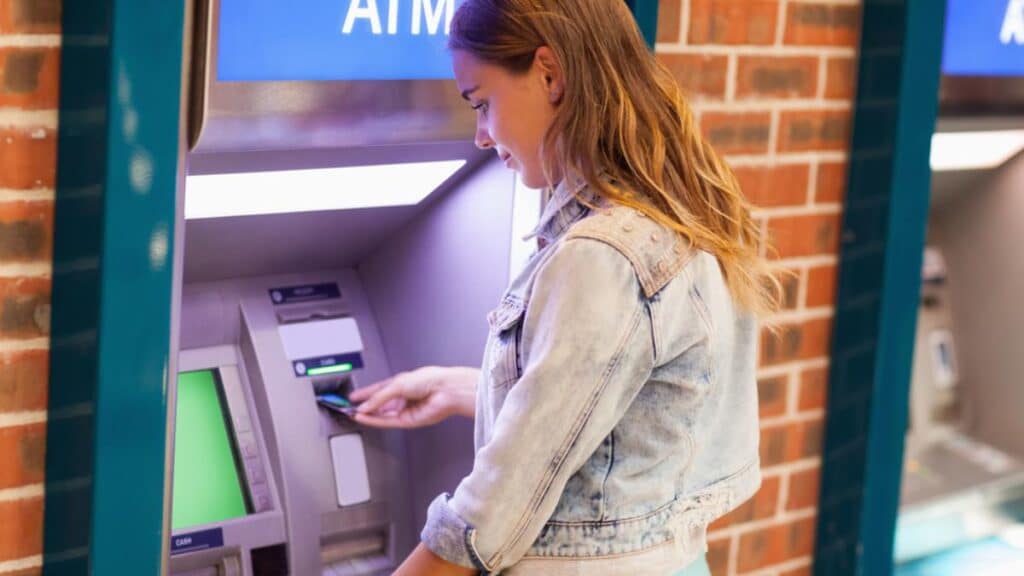 girl at ATM machine