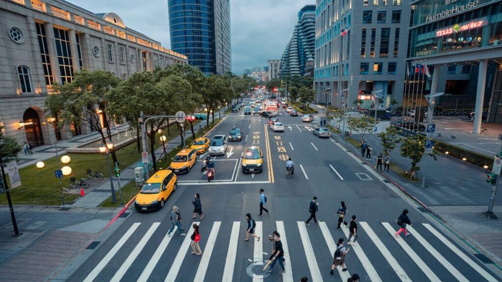 pedestrians in busy crosswalk - Jimmy Liao canva