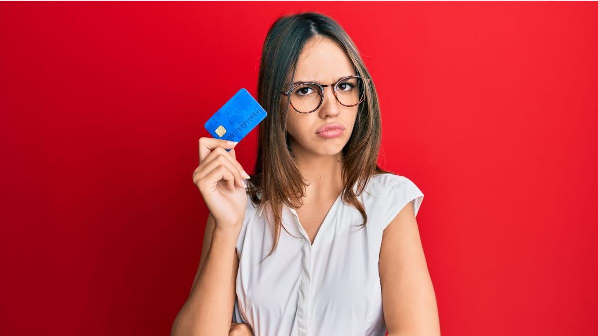 sad girl with credit card background