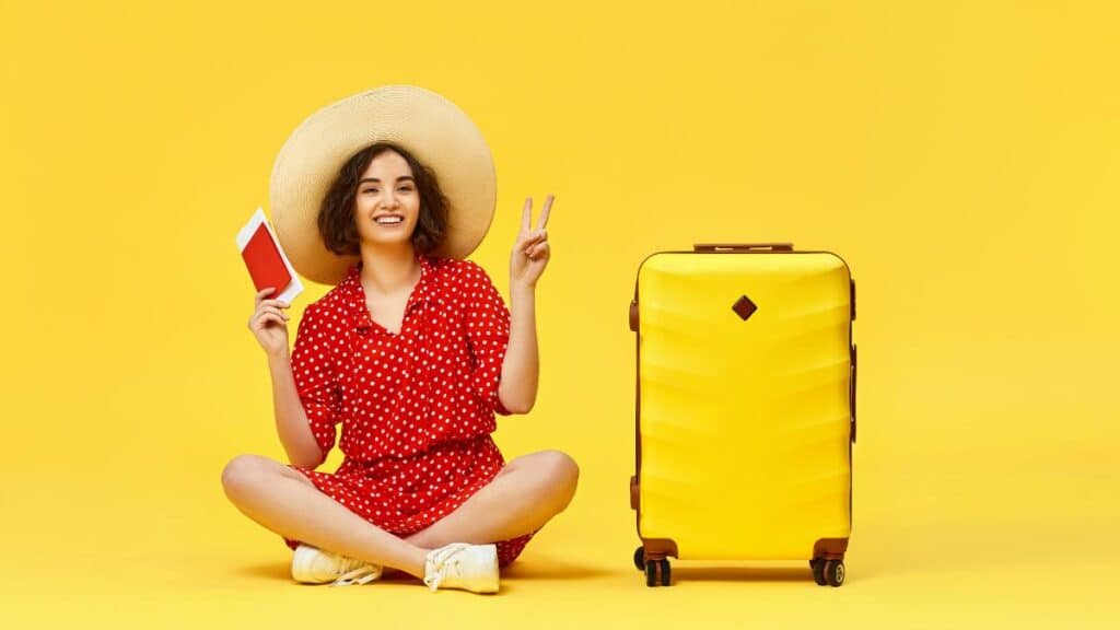 woman tourist yellow background