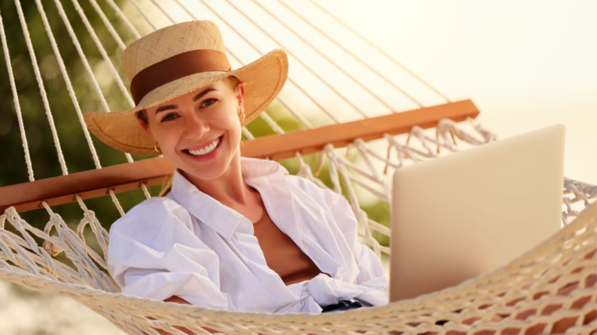 woman working in hammock -