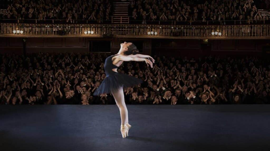 Ballerina performing on stage in theater
