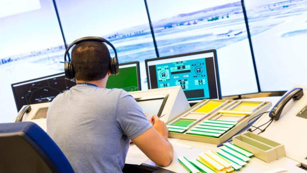 air traffic controller man in tower