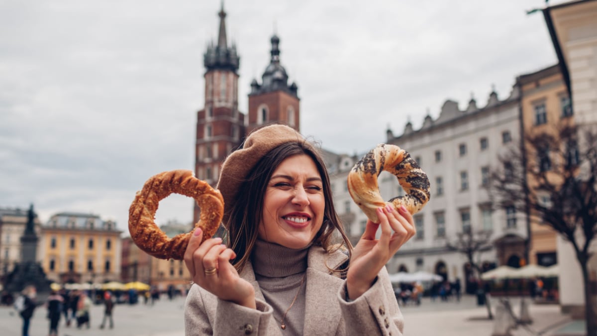 tourist woman eating pretzels