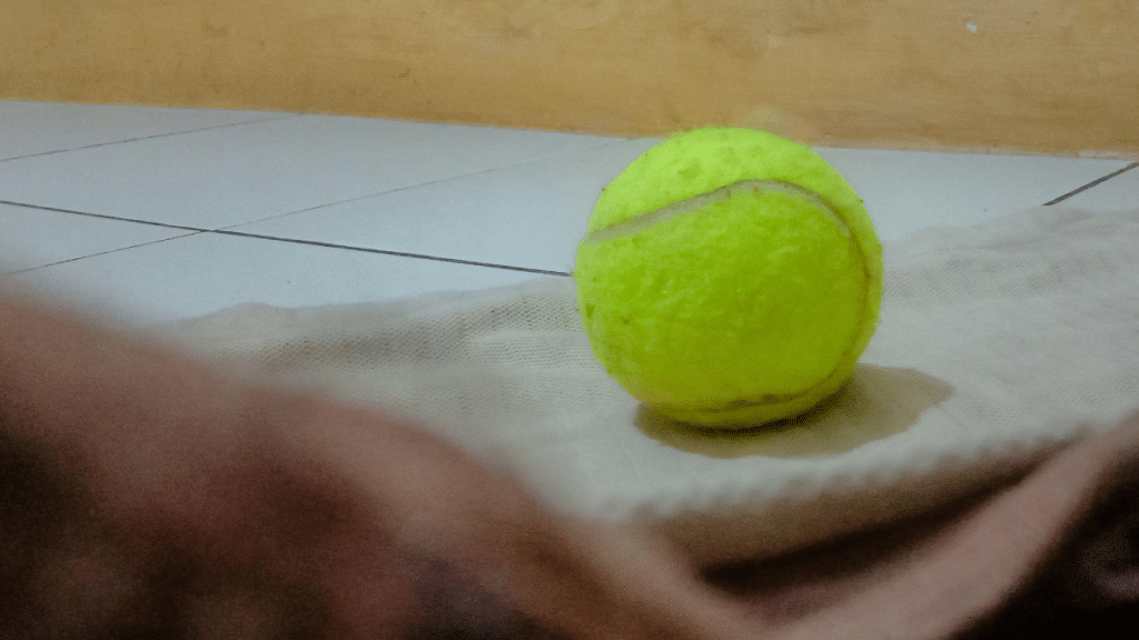 Tennis balls can help unclog the toilet