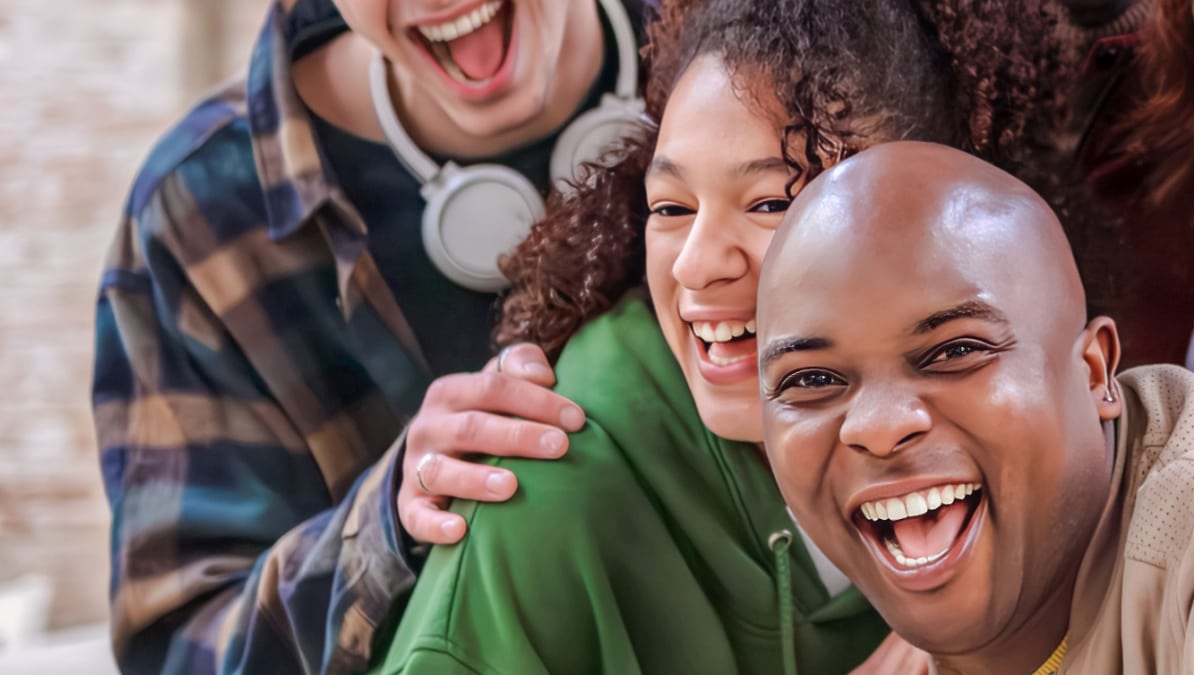 loud rowdy laughing people - Armando OliveiraShutterstock