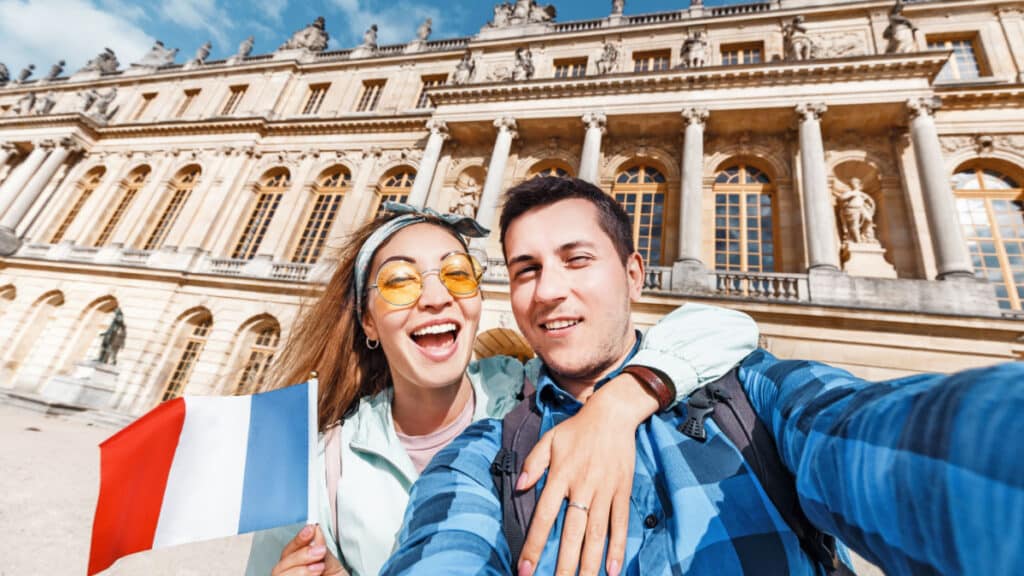 man at palace of Versailles
