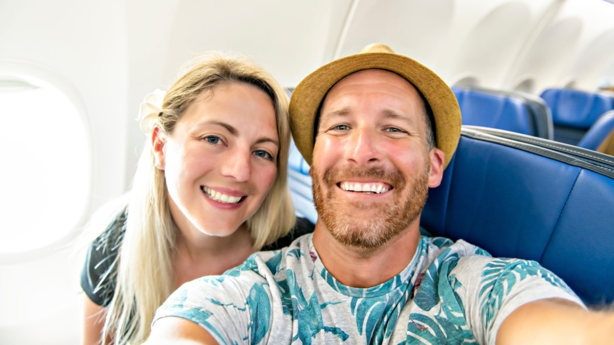 man woman on airplane