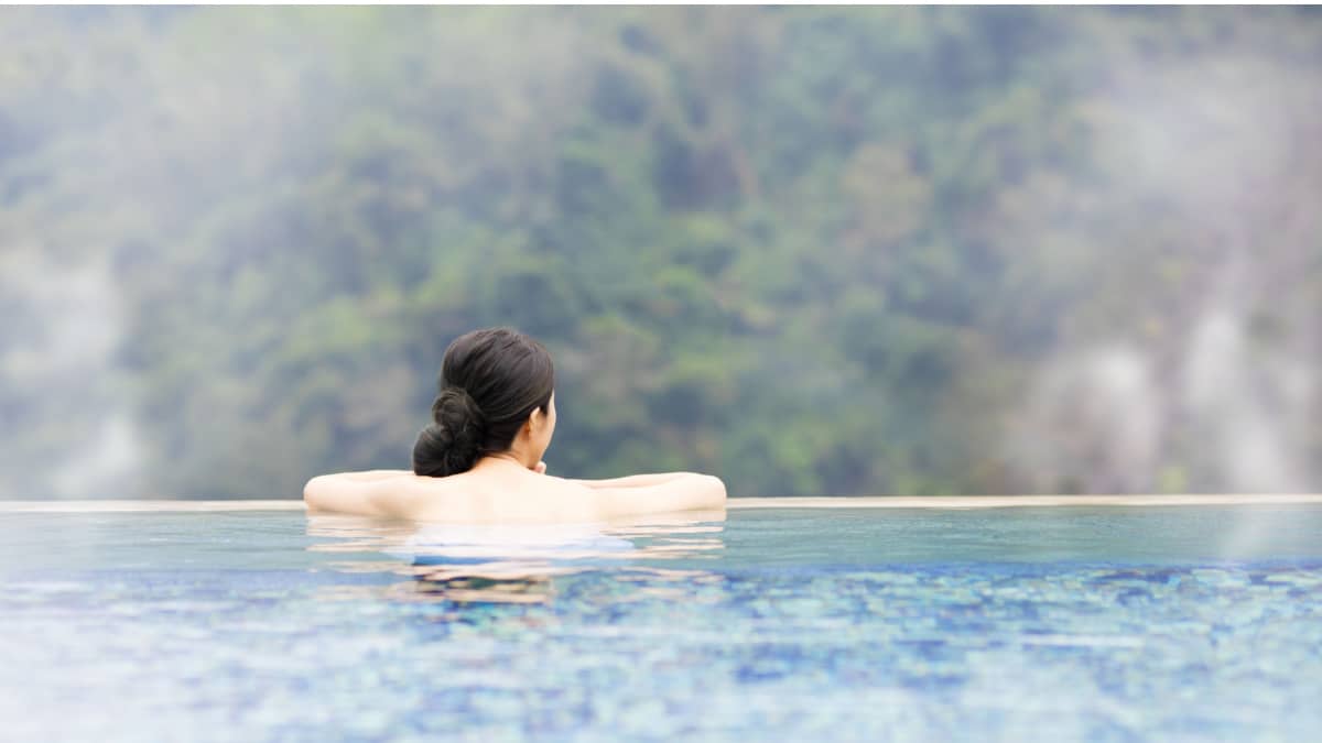 woman enjoying hot spring