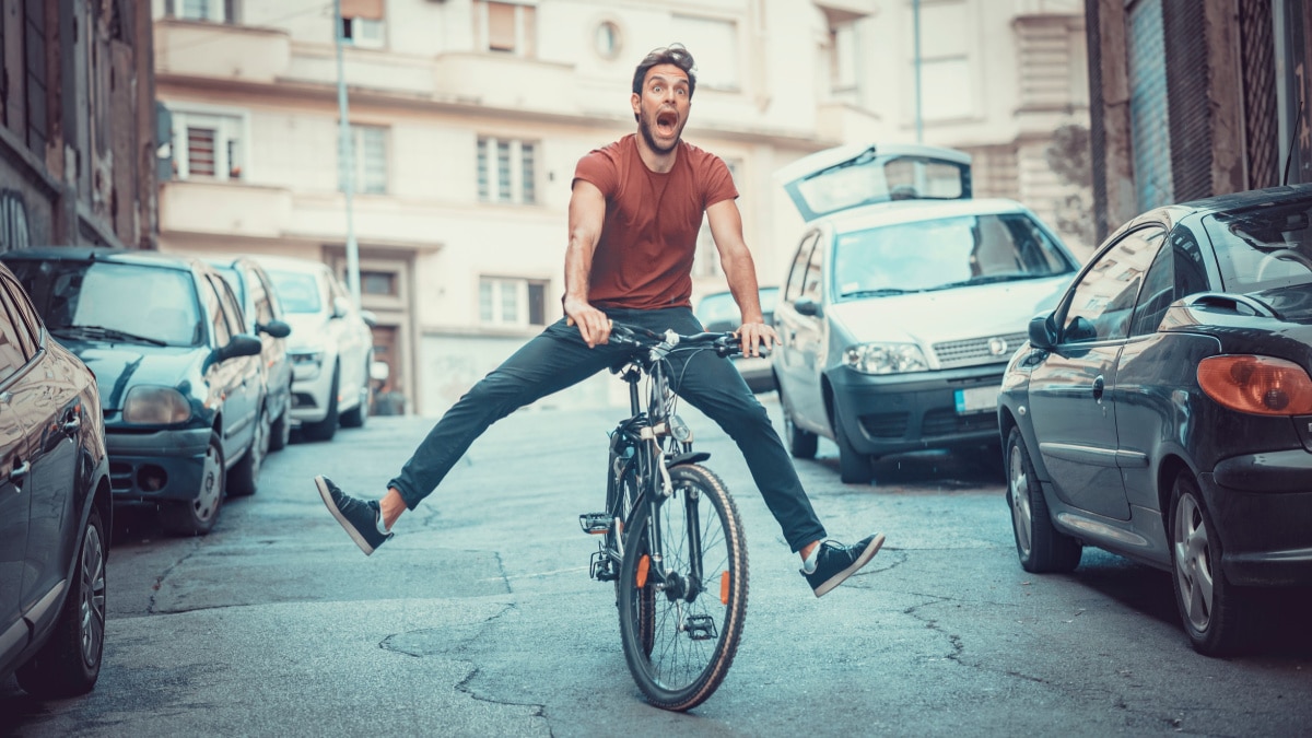 funny man on bicycle