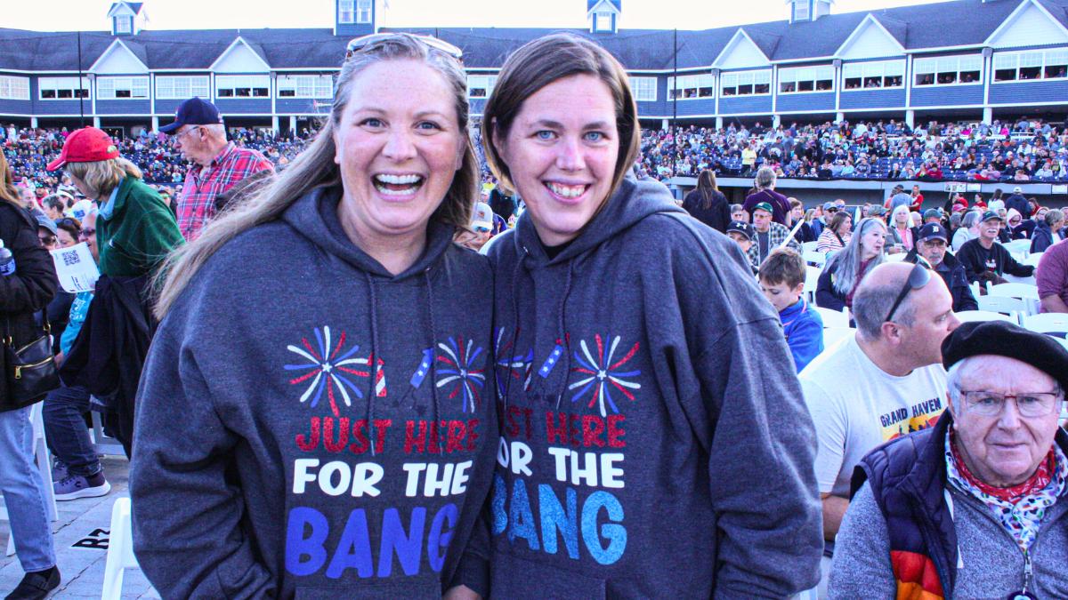 two women enjoying preshow