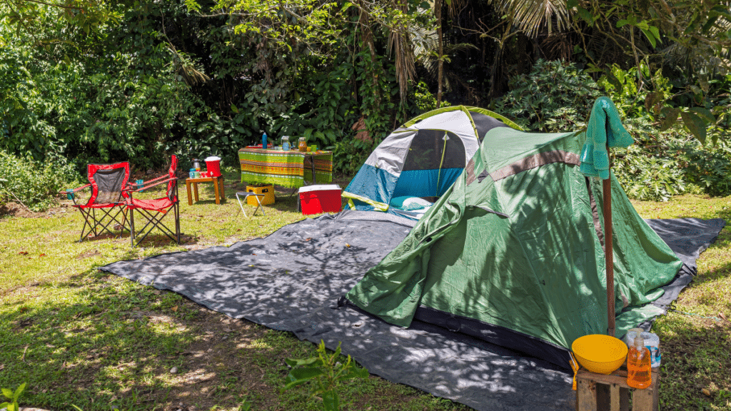 Camp site in tropical forest, soap and towel