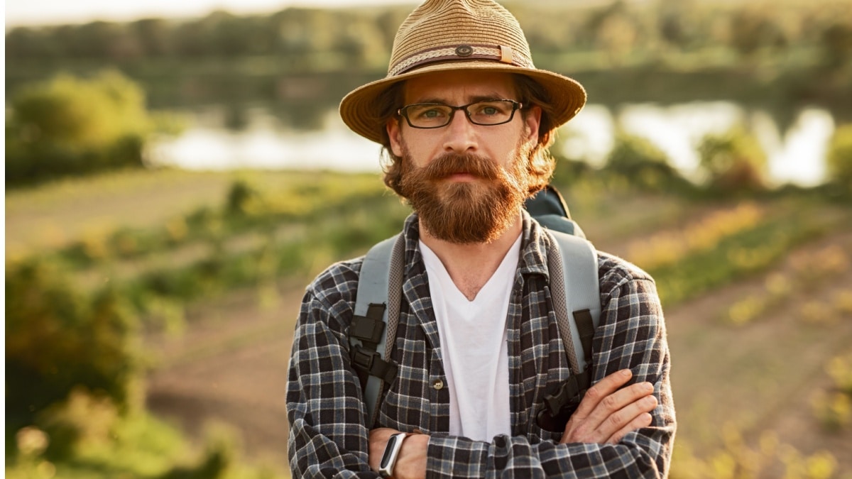 serious tourist folded arms
